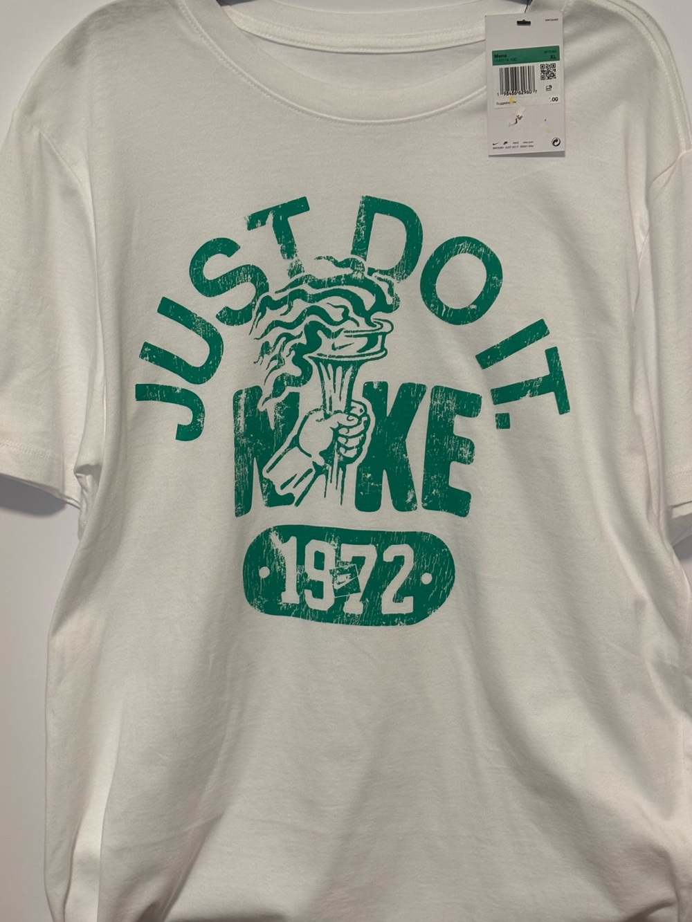 Nike White Short-Sleeve Tee with Green 'Just Do It' Torch Graphic